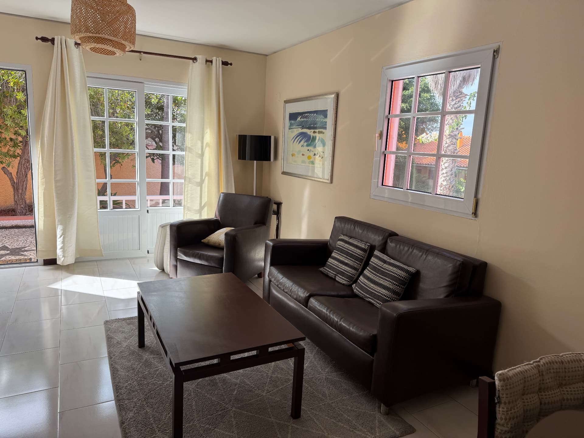 Sunlit Classic Villa lounge with garden doors