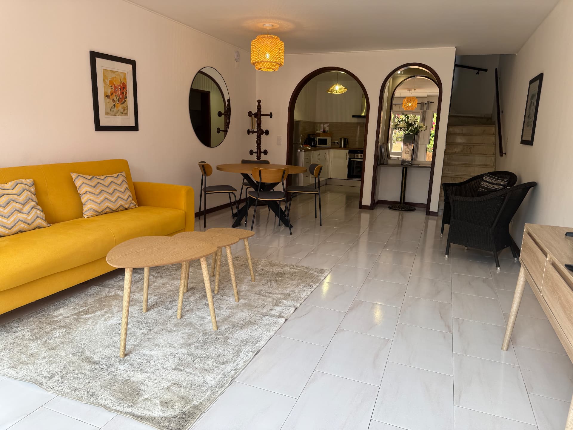 Corner view of the Comfort Villa showing the flow between living, dining and staircase